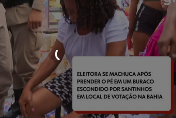 Mulher cai em buraco "coberto" por santinhos; espalhar esse tipo de material no chão é crime eleitoral